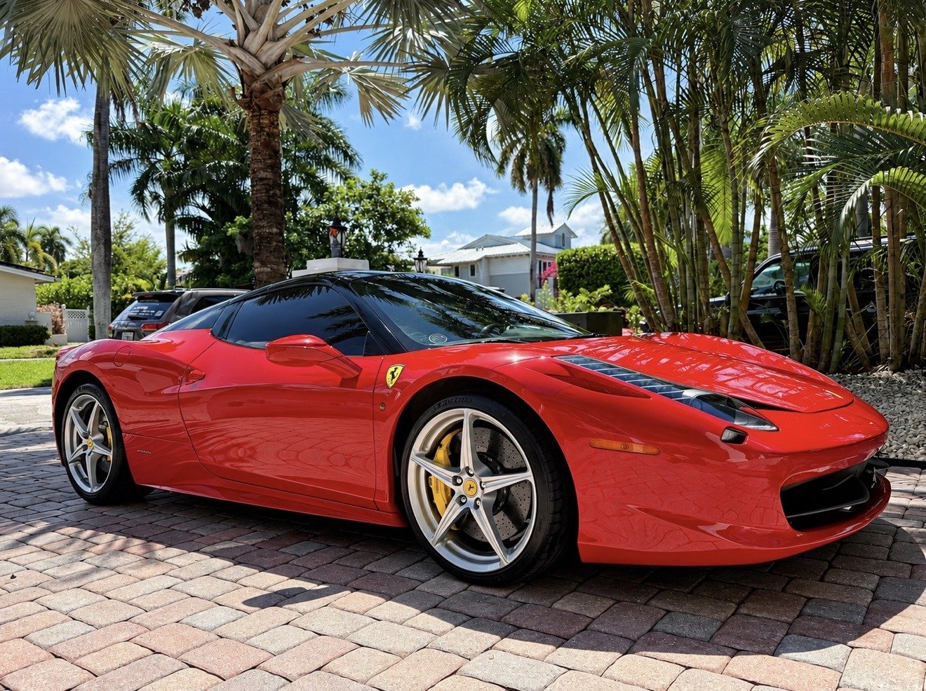 Red Ferrari with deep gloss after professional detailing in Fort Lauderdale