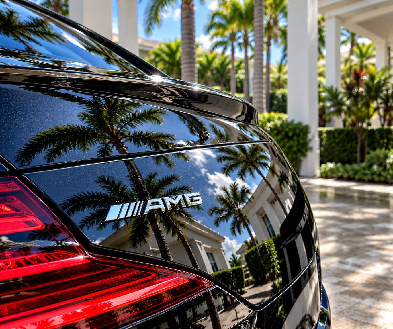Glossy black Mercedes-AMG with deep reflections after professional detailing in Fort Lauderdale